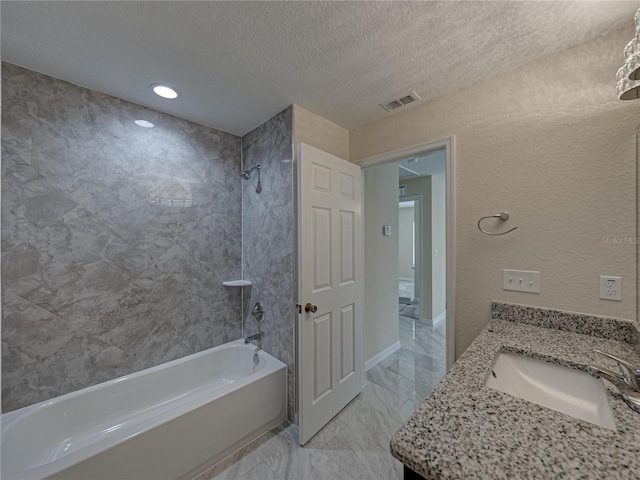 1415 Southern Ave, Lakeland, FL 33803 - bathroom with shower / tub combination, a textured ceiling, marble finish flooring, vanity, and recessed lighting
