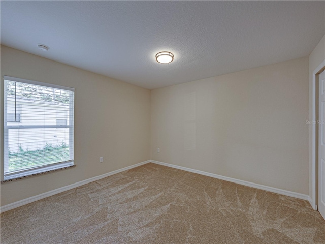 1415 Southern Ave, Lakeland, FL 33803 - carpeted empty room with baseboards