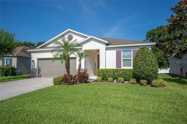 4303 Moon Shadow Loop, Mulberry, FL 33860 - ranch-style home featuring concrete driveway, an attached garage, a front yard, and stucco siding
