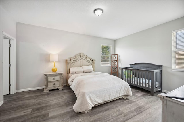 4303 Moon Shadow Loop, Mulberry, FL 33860 - bedroom featuring wood finished floors and baseboards
