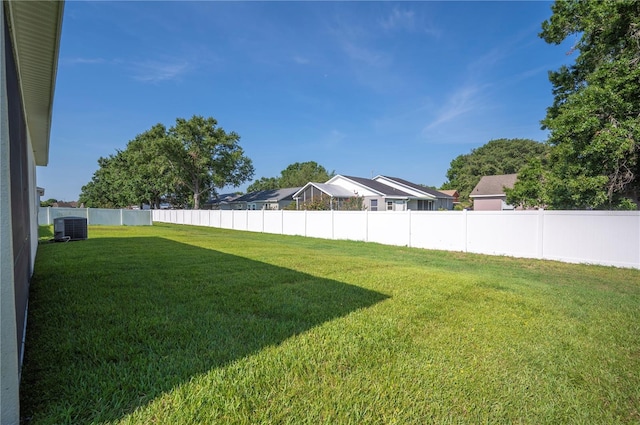 4303 Moon Shadow Loop, Mulberry, FL 33860 - view of yard featuring central AC unit