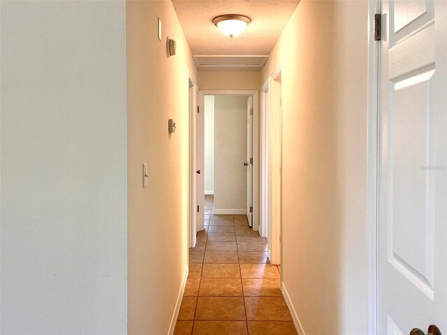 2323 Ridgeview Dr, Lakeland, FL 33810 - hall featuring light tile patterned floors and baseboards