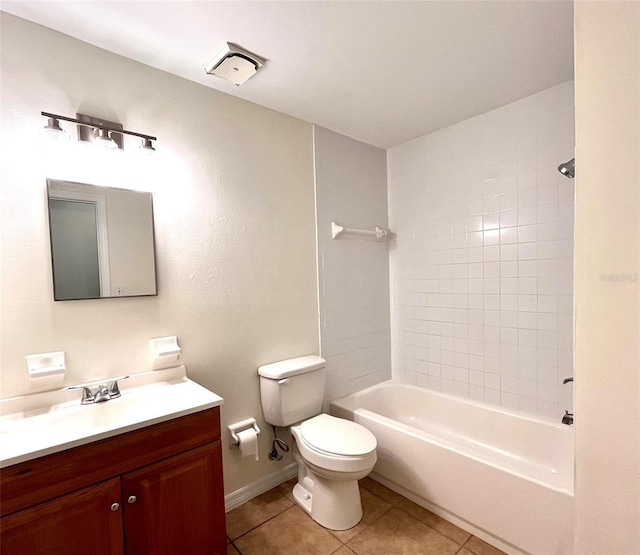 2323 Ridgeview Dr, Lakeland, FL 33810 - full bath with tile patterned flooring, toilet, vanity,  shower combination, and baseboards