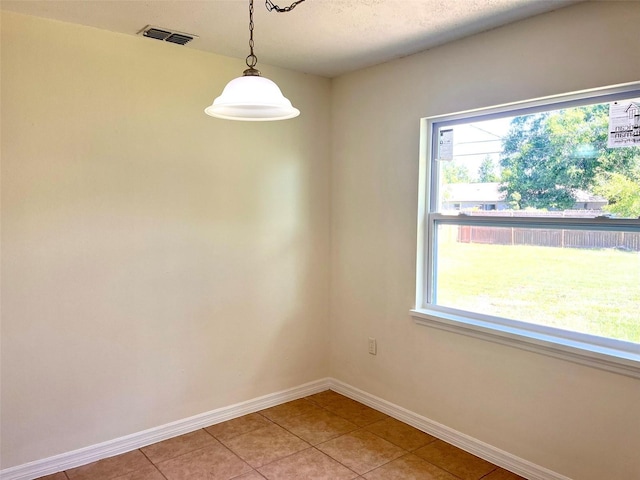 2323 Ridgeview Dr, Lakeland, FL 33810 - unfurnished room with baseboards and light tile patterned floors