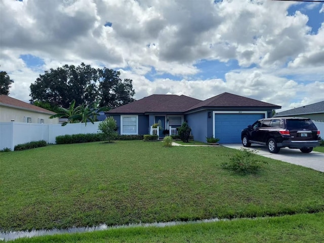 455 Eagle Dr, Kissimmee, FL 34759 - single story home featuring an attached garage, driveway, and stucco siding