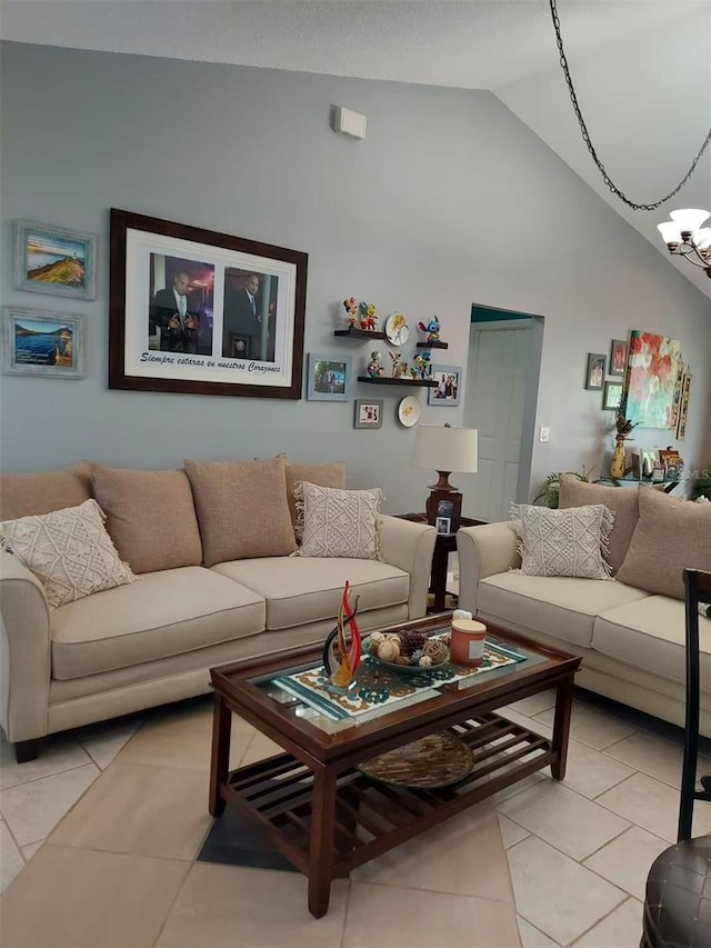 455 Eagle Dr, Kissimmee, FL 34759 - living area with light tile patterned floors, high vaulted ceiling, and a chandelier