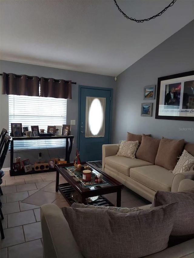 455 Eagle Dr, Kissimmee, FL 34759 - tiled living room with vaulted ceiling