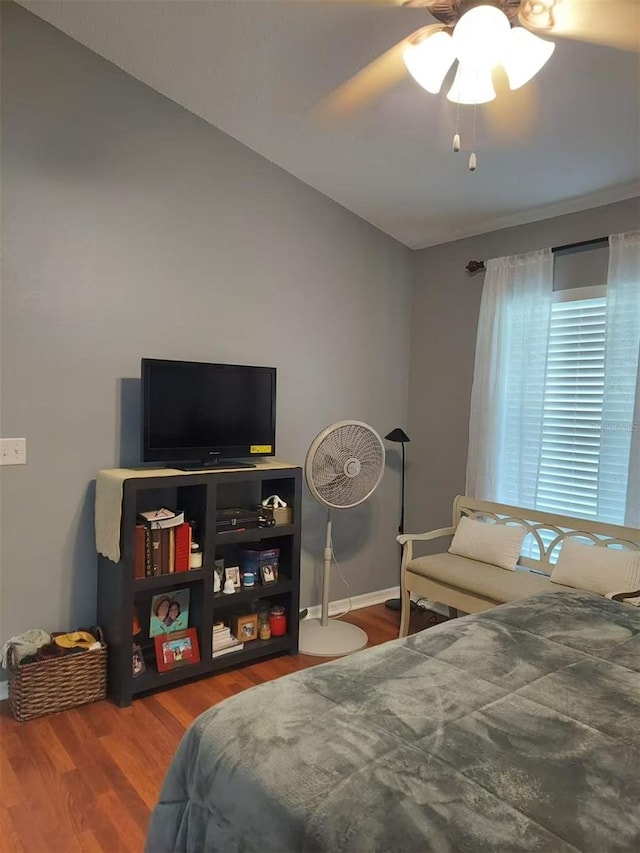 455 Eagle Dr, Kissimmee, FL 34759 - bedroom featuring wood finished floors, ceiling fan, and baseboards