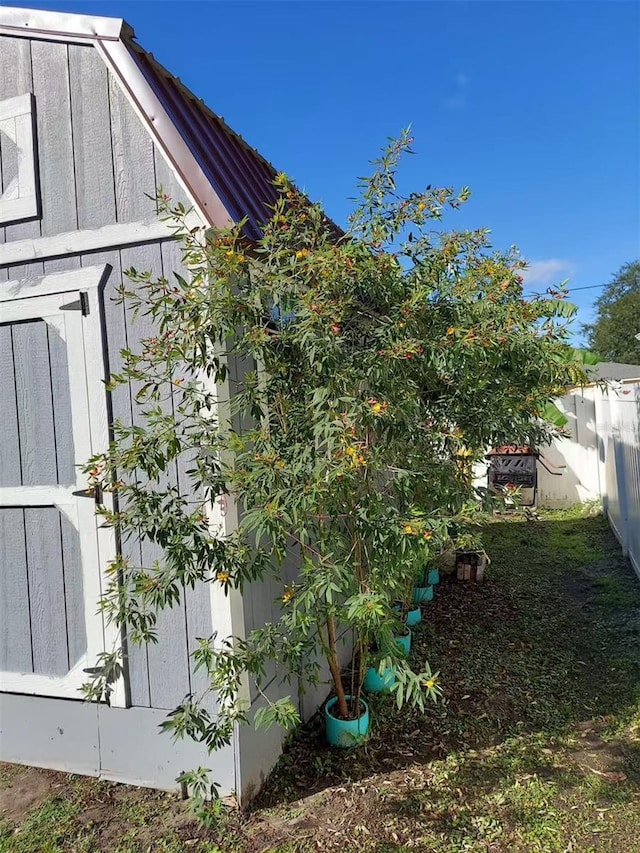 455 Eagle Dr, Kissimmee, FL 34759 - view of home's exterior featuring fence
