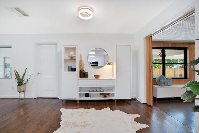 312 Palencia Pl, Lakeland, FL 33803 - hall featuring wood finished floors and baseboards