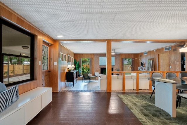312 Palencia Pl, Lakeland, FL 33803 - reception area with wood walls and ceiling fan