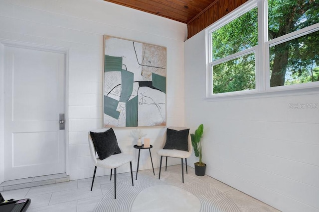 312 Palencia Pl, Lakeland, FL 33803 - sitting room with wooden ceiling and tile patterned floors