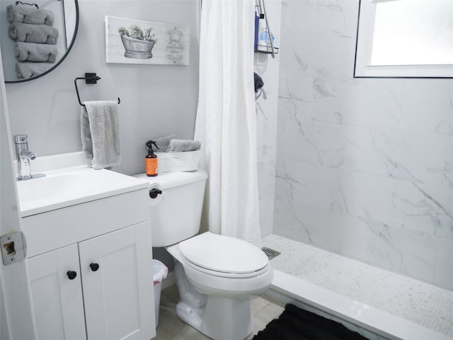 355 E Columbia St, Lake Alfred, FL 33850 - bathroom with vanity, toilet, and a stall shower