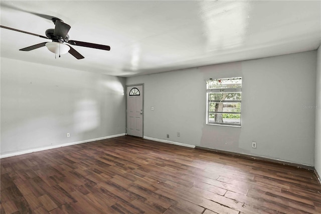 633 Glenda St, Lakeland, FL 33805 - spare room featuring wood finished floors, baseboards, and a ceiling fan
