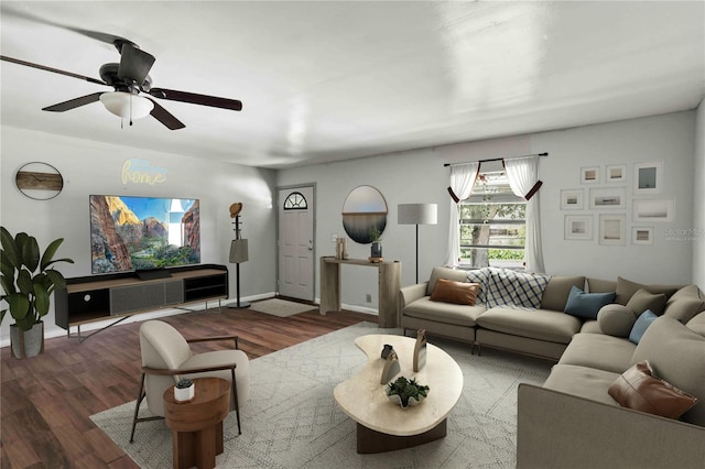 633 Glenda St, Lakeland, FL 33805 - living room featuring wood finished floors, ceiling fan, and baseboards