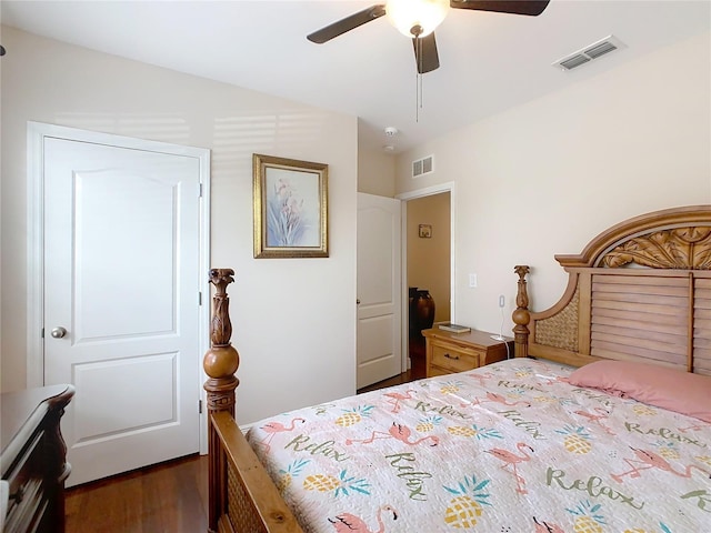 bedroom with wood finished floors and a ceiling fan