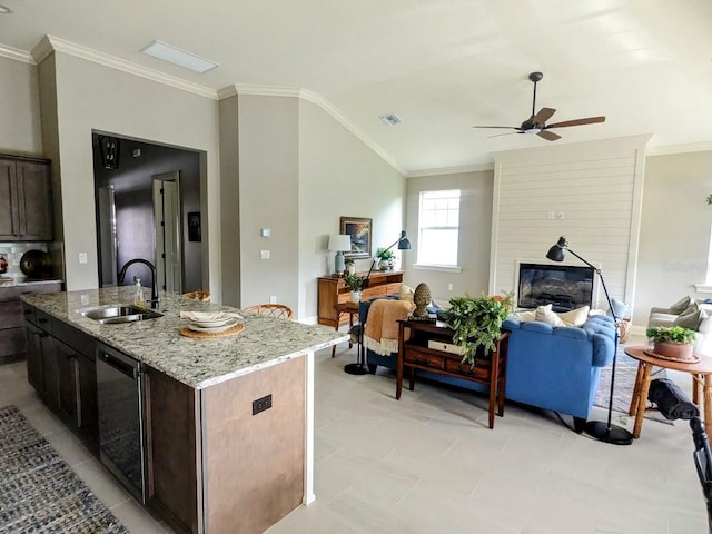 7919 Lake James Blvd, Lakeland, FL 33810 - kitchen featuring a sink, open floor plan, ceiling fan, black dishwasher, and crown molding