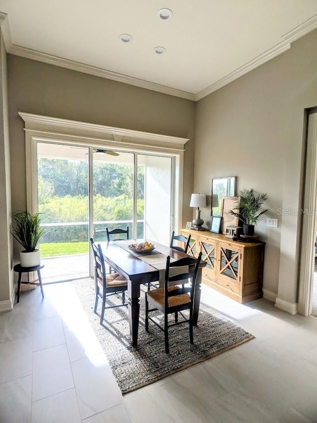 7919 Lake James Blvd, Lakeland, FL 33810 - dining space featuring healthy amount of natural light, baseboards, crown molding, and recessed lighting