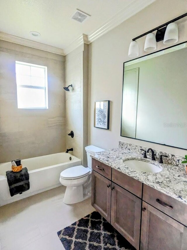 7919 Lake James Blvd, Lakeland, FL 33810 - full bathroom with ornamental molding, toilet, vanity, and tile patterned floors