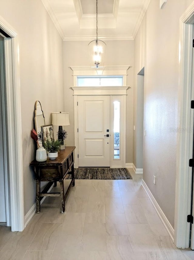 7919 Lake James Blvd, Lakeland, FL 33810 - entrance foyer with marble finish floors, crown molding, baseboards, and a tray ceiling