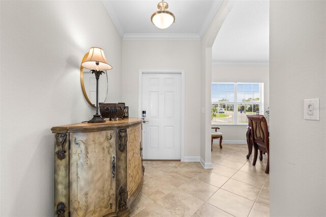 3136 Langdon Ln, Winter Haven, FL 33884 - entrance foyer with ornamental molding, baseboards, and light tile patterned flooring