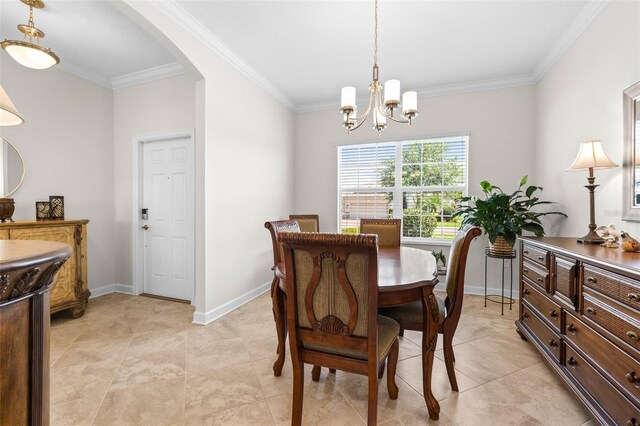 3136 Langdon Ln, Winter Haven, FL 33884 - dining space featuring ornamental molding, arched walkways, a chandelier, baseboards, and light tile patterned floors