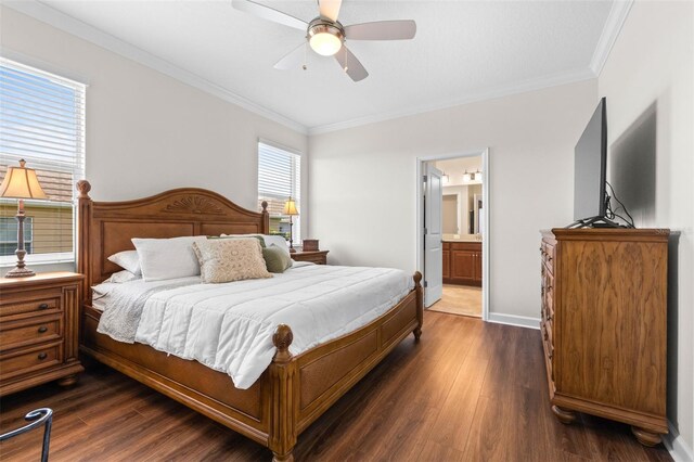 3136 Langdon Ln, Winter Haven, FL 33884 - bedroom featuring crown molding, dark wood-style flooring, connected bathroom, a ceiling fan, and baseboards