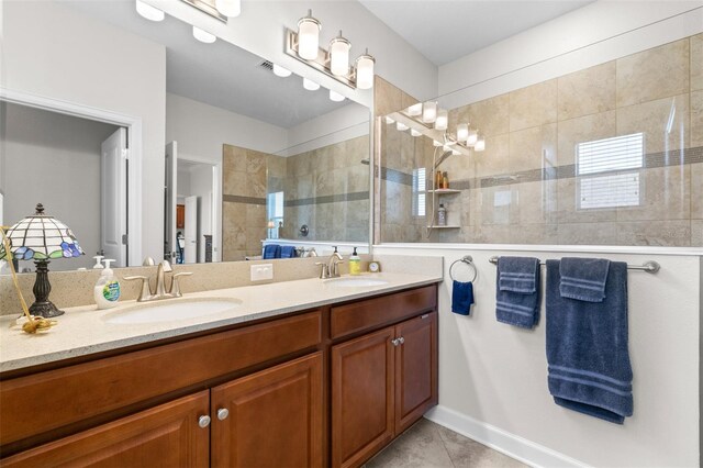 3136 Langdon Ln, Winter Haven, FL 33884 - bathroom with double vanity, a walk in shower, and tile patterned flooring