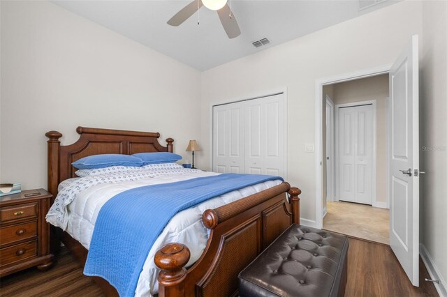 3136 Langdon Ln, Winter Haven, FL 33884 - bedroom featuring dark wood-style flooring, a closet, and a ceiling fan