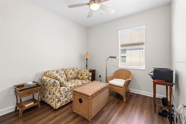 3136 Langdon Ln, Winter Haven, FL 33884 - living area featuring dark wood-type flooring, ceiling fan, and baseboards