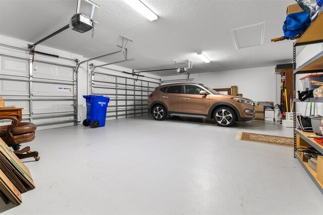 3136 Langdon Ln, Winter Haven, FL 33884 - garage featuring a garage door opener