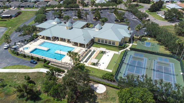3136 Langdon Ln, Winter Haven, FL 33884 - aerial perspective of suburban area featuring a pool area