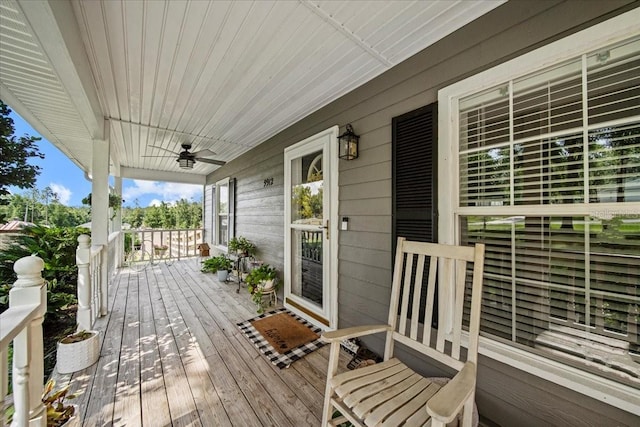 9912 Pine Leaf Ln, Dade City, FL 33525 - wooden porch featuring a ceiling fan