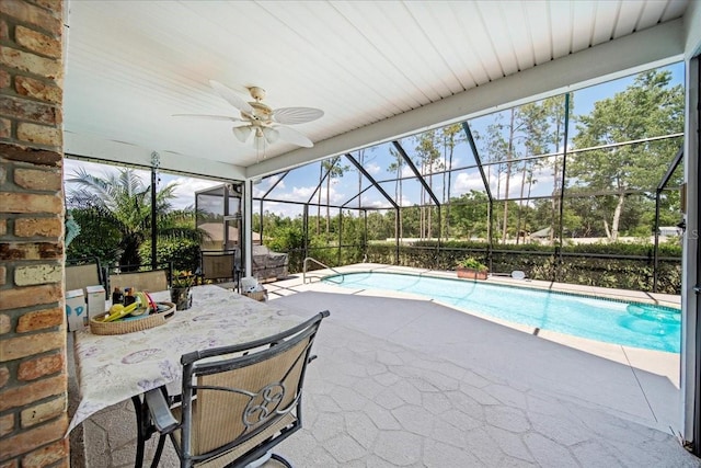 9912 Pine Leaf Ln, Dade City, FL 33525 - outdoor pool with a patio, ceiling fan, and a lanai