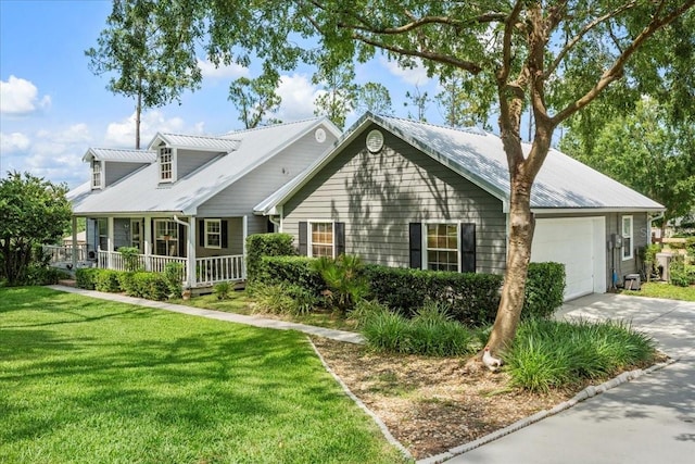 9912 Pine Leaf Ln, Dade City, FL 33525 - cape cod home with a garage, driveway, a front yard, and metal roof