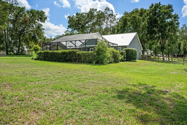 9912 Pine Leaf Ln, Dade City, FL 33525 - view of yard featuring a lanai