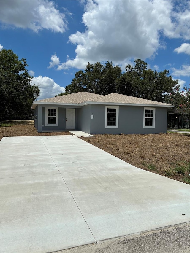 1329 Tom Watson Rd, Lakeland, FL 33801 - ranch-style home with stucco siding