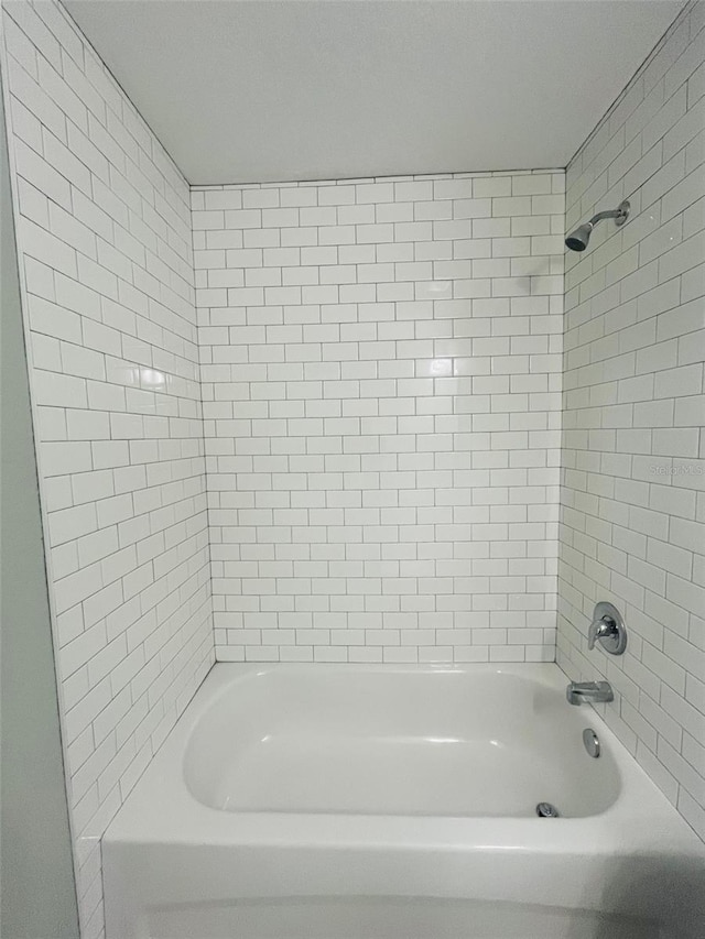 1329 Tom Watson Rd, Lakeland, FL 33801 - bathroom featuring shower / bath combination