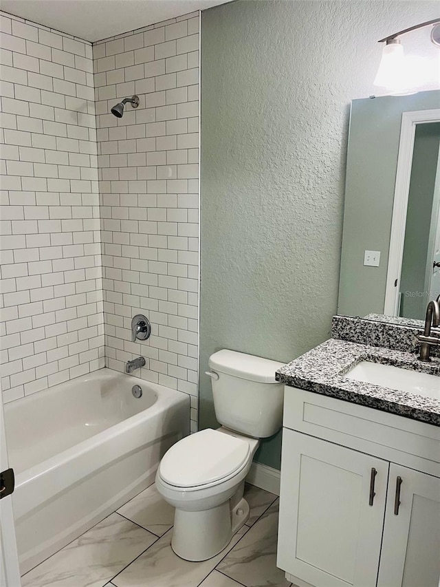 1329 Tom Watson Rd, Lakeland, FL 33801 - full bathroom featuring a textured wall, vanity, toilet, marble finish floors, and shower / tub combination