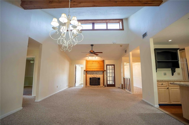 1920 Indian Trails Ct, Lakeland, FL 33813 - unfurnished living room featuring carpet, a towering ceiling, ceiling fan, a fireplace, and baseboards