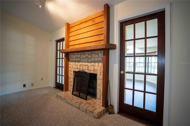 1920 Indian Trails Ct, Lakeland, FL 33813 - unfurnished living room with a brick fireplace, carpet flooring, and baseboards