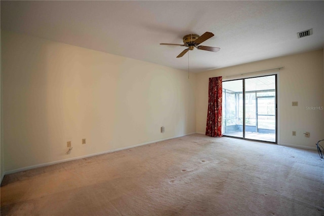 1920 Indian Trails Ct, Lakeland, FL 33813 - unfurnished room featuring light carpet, a ceiling fan, and baseboards