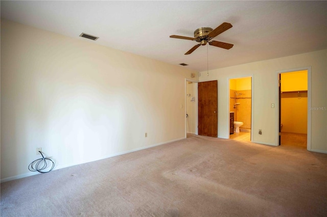 1920 Indian Trails Ct, Lakeland, FL 33813 - unfurnished bedroom featuring a spacious closet, carpet floors, a closet, and baseboards