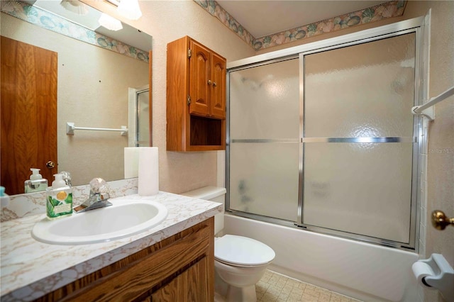 1920 Indian Trails Ct, Lakeland, FL 33813 - full bathroom featuring enclosed tub / shower combo, vanity, and toilet