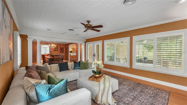 323 E Belvedere St, Lakeland, FL 33803 - living area with ornate columns, plenty of natural light, a chandelier, ceiling fan, and ornamental molding