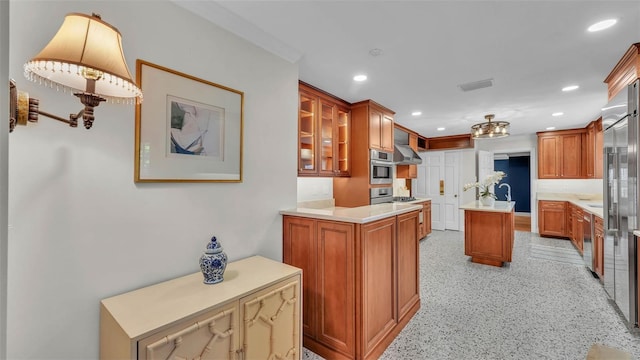323 E Belvedere St, Lakeland, FL 33803 - kitchen featuring stainless steel appliances, recessed lighting, light countertops, glass insert cabinets, and brown cabinetry