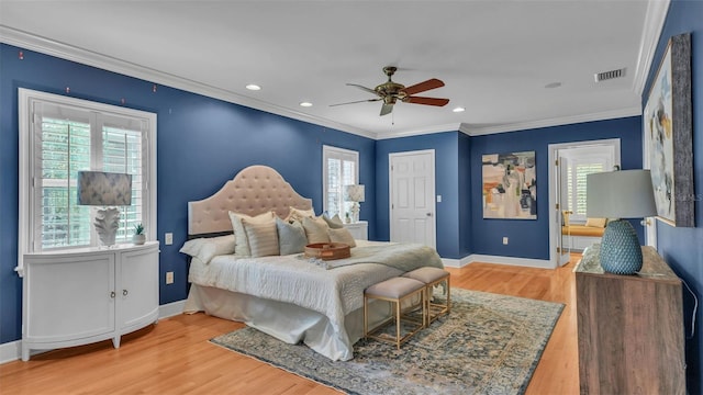 323 E Belvedere St, Lakeland, FL 33803 - bedroom with multiple windows, ornamental molding, baseboards, and recessed lighting