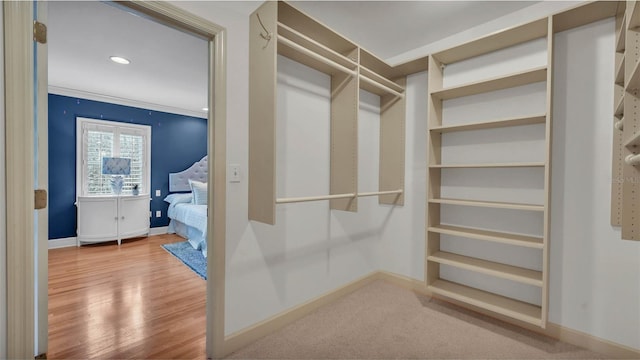 323 E Belvedere St, Lakeland, FL 33803 - spacious closet featuring wood finished floors
