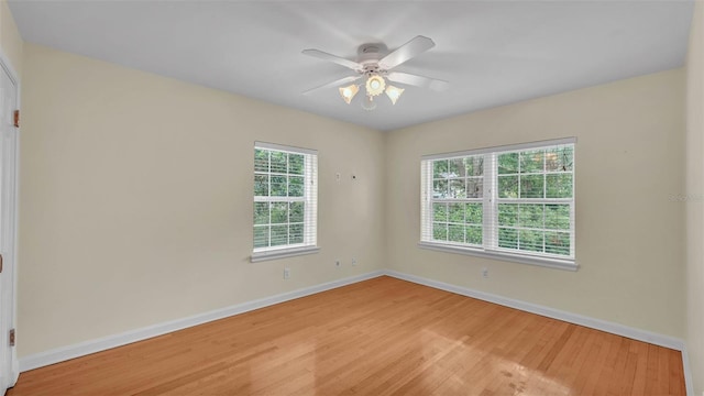 323 E Belvedere St, Lakeland, FL 33803 - unfurnished room with baseboards, light wood finished floors, and ceiling fan
