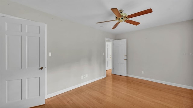323 E Belvedere St, Lakeland, FL 33803 - empty room with baseboards, light wood finished floors, and a ceiling fan